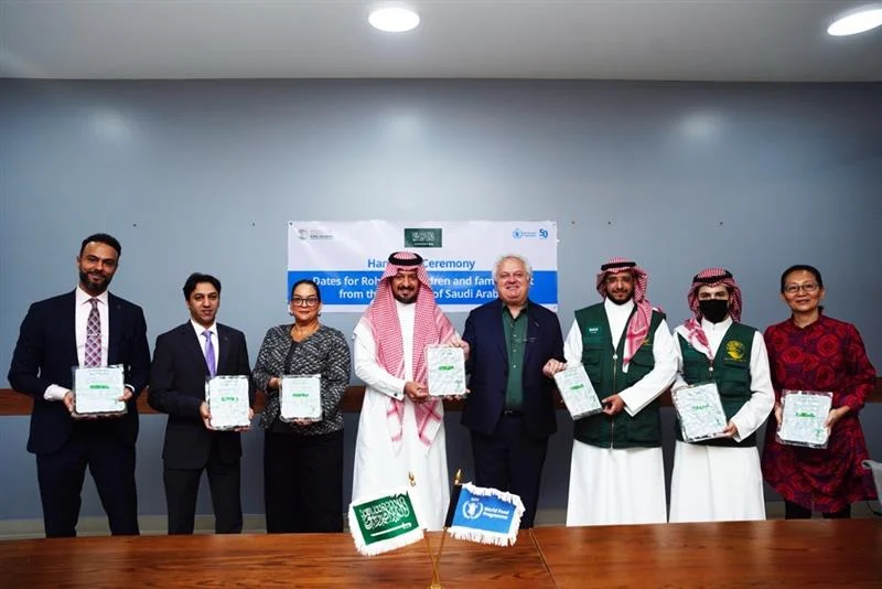 Saudi arabia donates dates to rohingya children