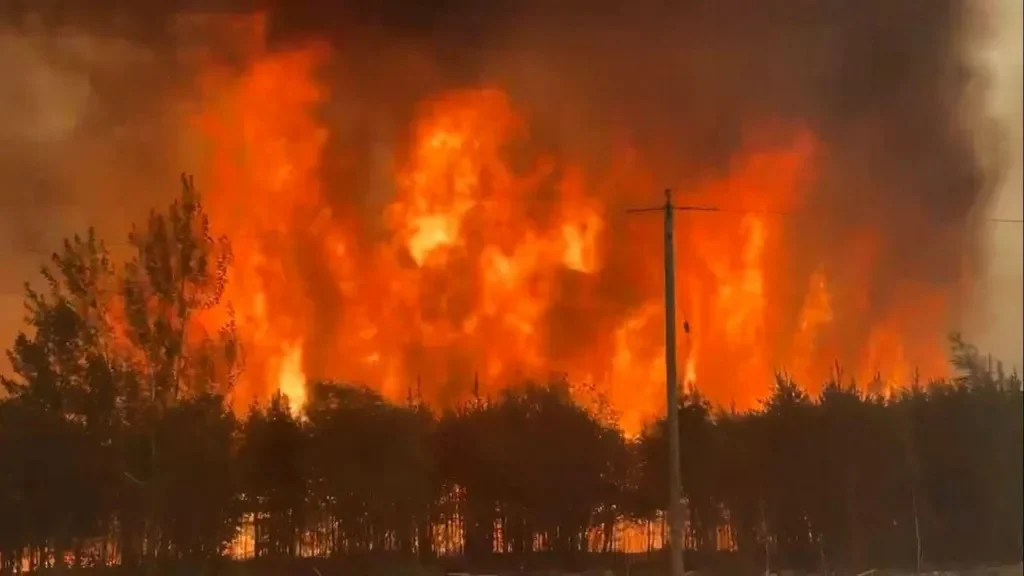 Fires are spreading rapidly, people are being evacuated by plane