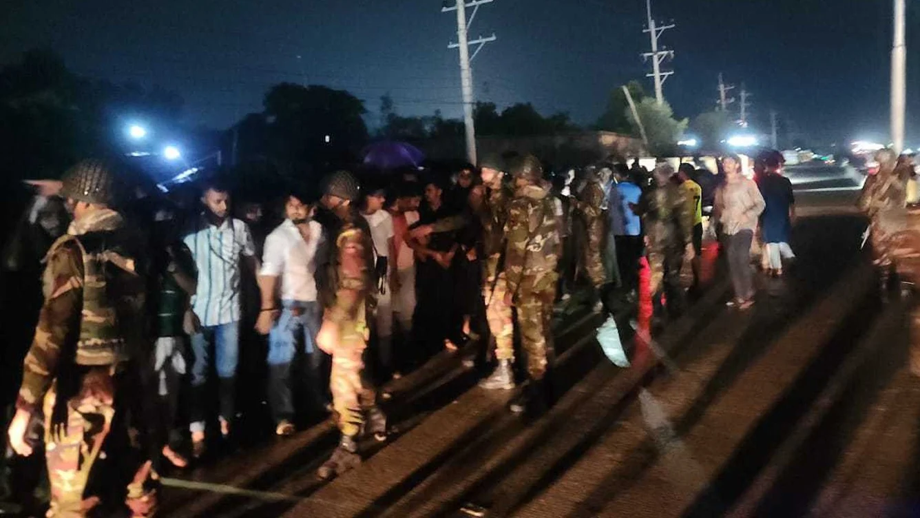 10 women detained in hotel crowds gather, army deployed