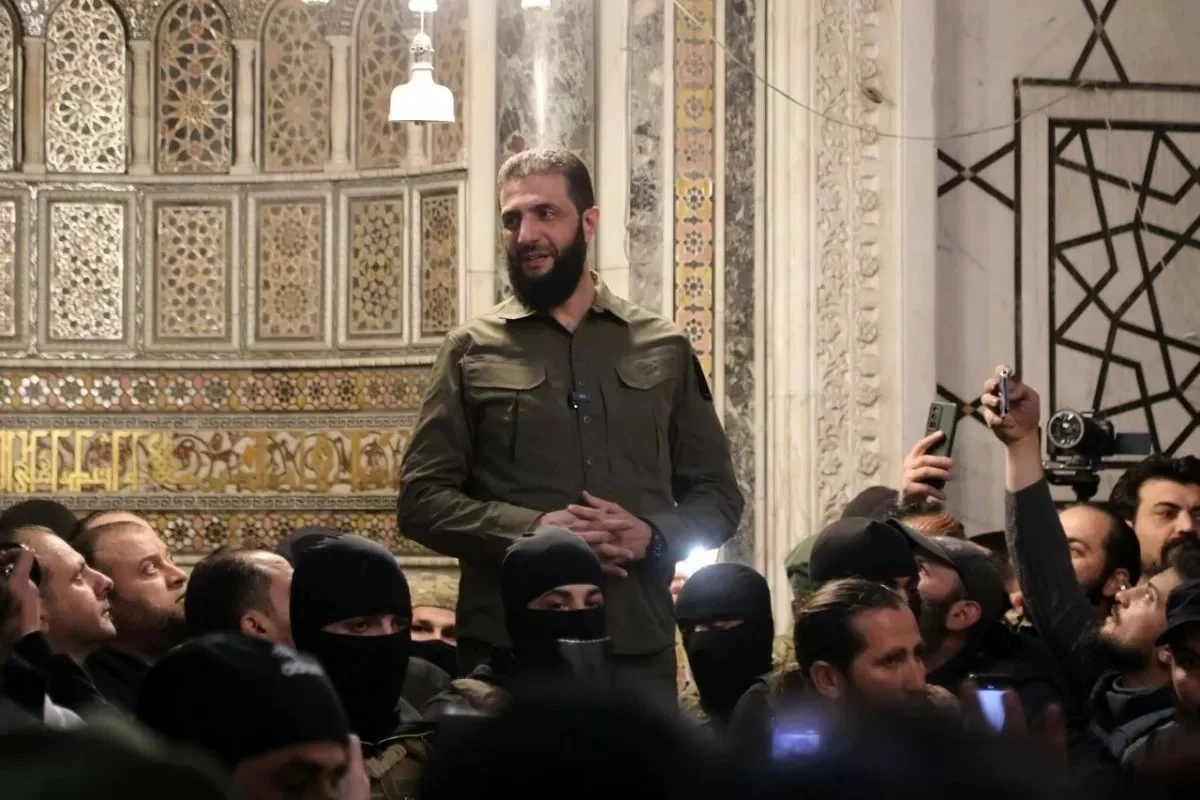 Us removes syrian president's organization from terrorist list